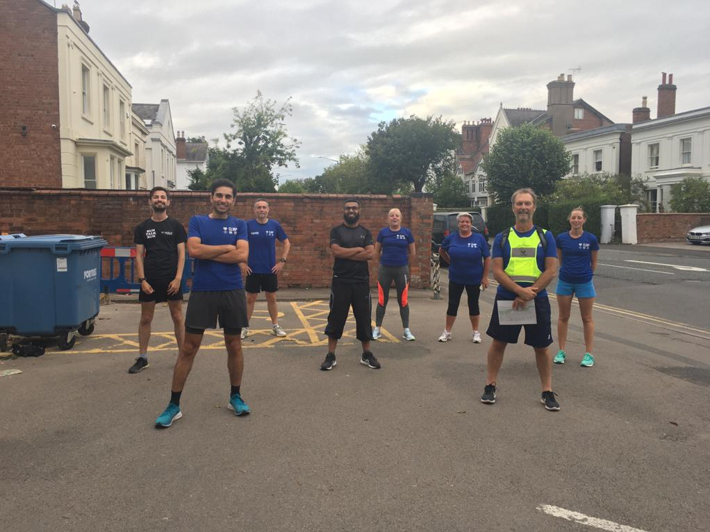 the team stood in their exercise outfits